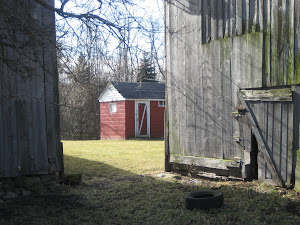 Side of barn and chicken coop