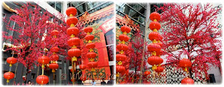2012 CNY decorations: giant cherry blossom trees and red lanterns at the entrance of Pavilion KL
