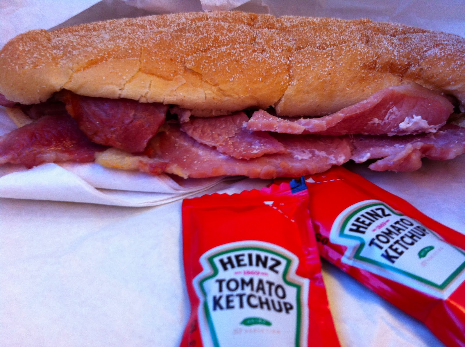 The Fry up Inspector Bacon roll & hot drink offer from Greater Anglia
