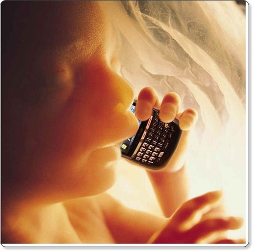 Embryo holding phone in womb