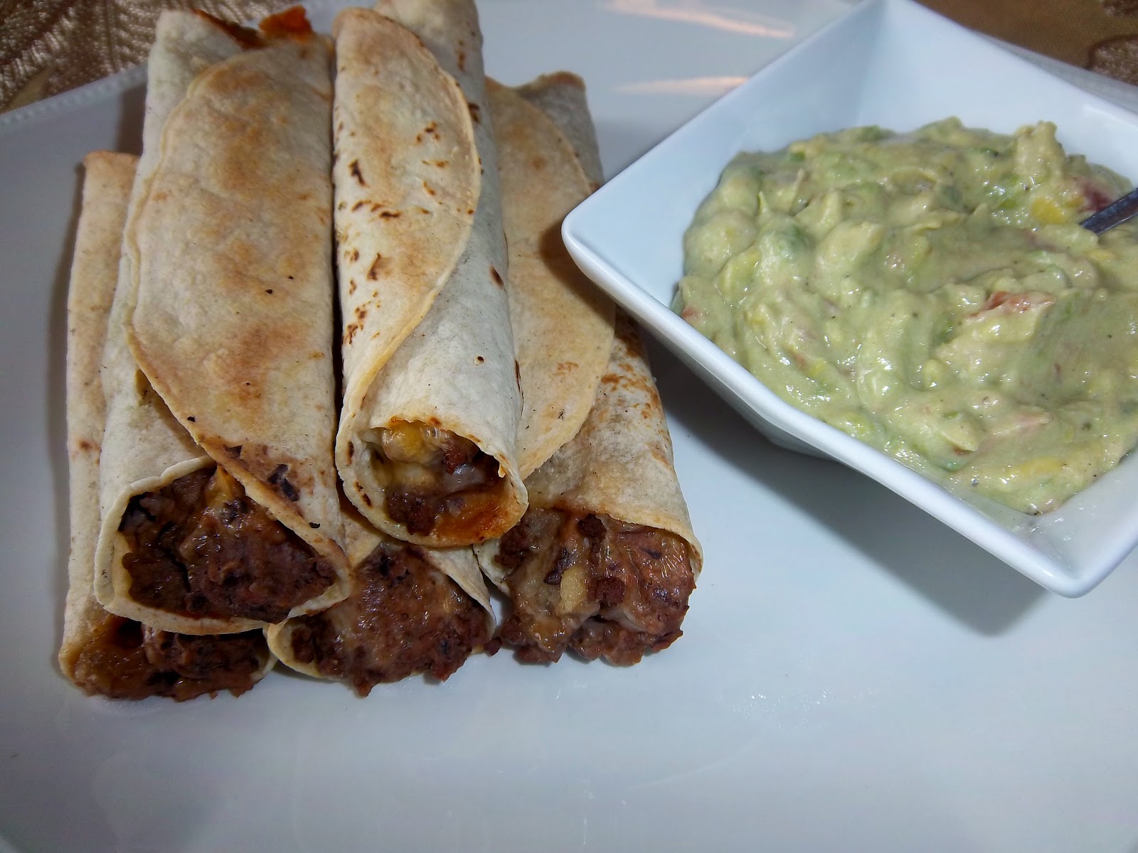 The best is yet to come Baked Beef Taquitos with Guacamole Dip