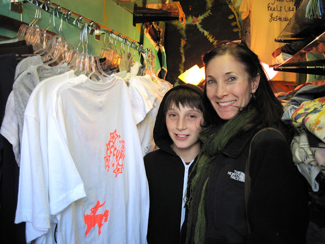 A line of two people make the World's Smallest Store look packed