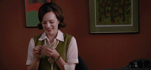 mad-men-peggy-counting-money.gif