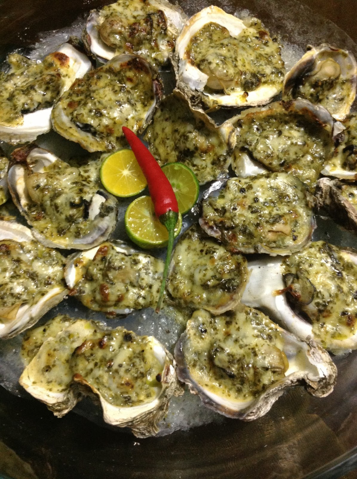 . ROCKEFELLER BAKED OYSTER IN SPINACH PESTO CREAM SAUCE
