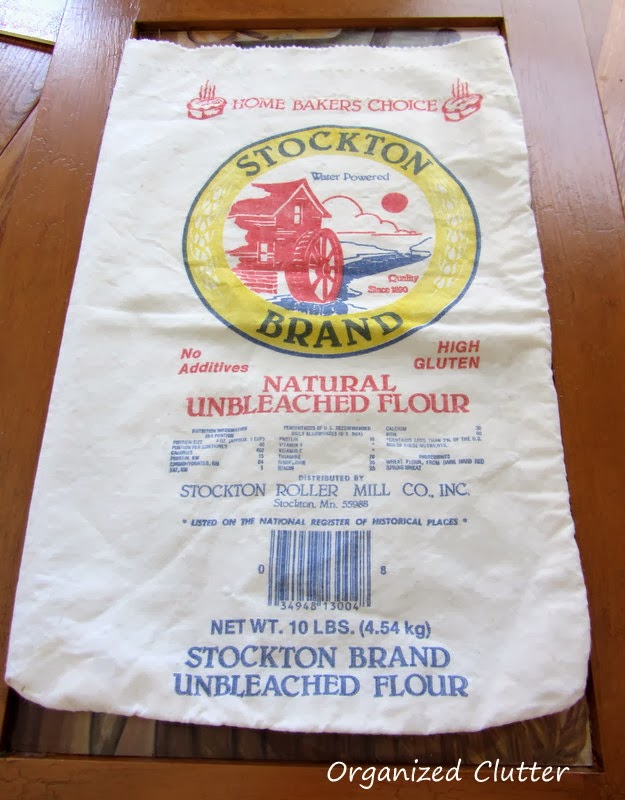 A Framed Flour Sack Organized Clutter