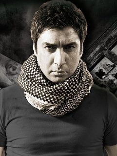 صور الفنان التركي بطل مسلسل وادي الذئاب نجاتي ششماز (مراد علمدار) 8