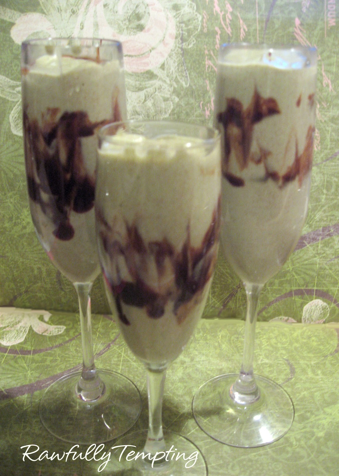 Blend all ingredients, except Chocolate Syrup, until creamy.