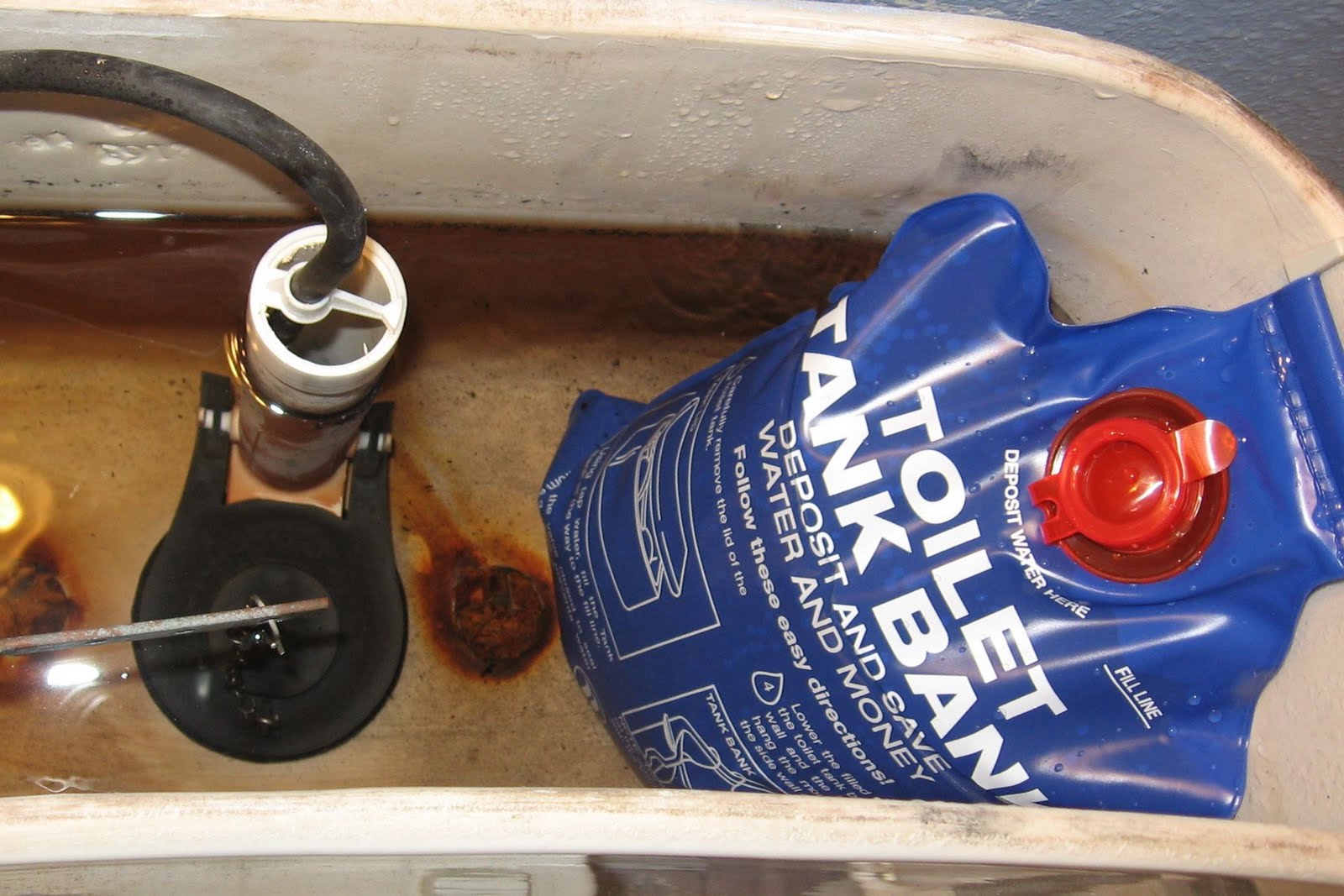 Convert a regular toilet to lowflow and save water • Brown Thumb Mama®