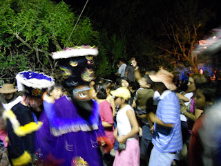 A bad shot of the chinelos as they danced by