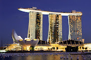 Marina Bay Sands features three 55story hotel towers which were topped out . (marina bay sands hotel )