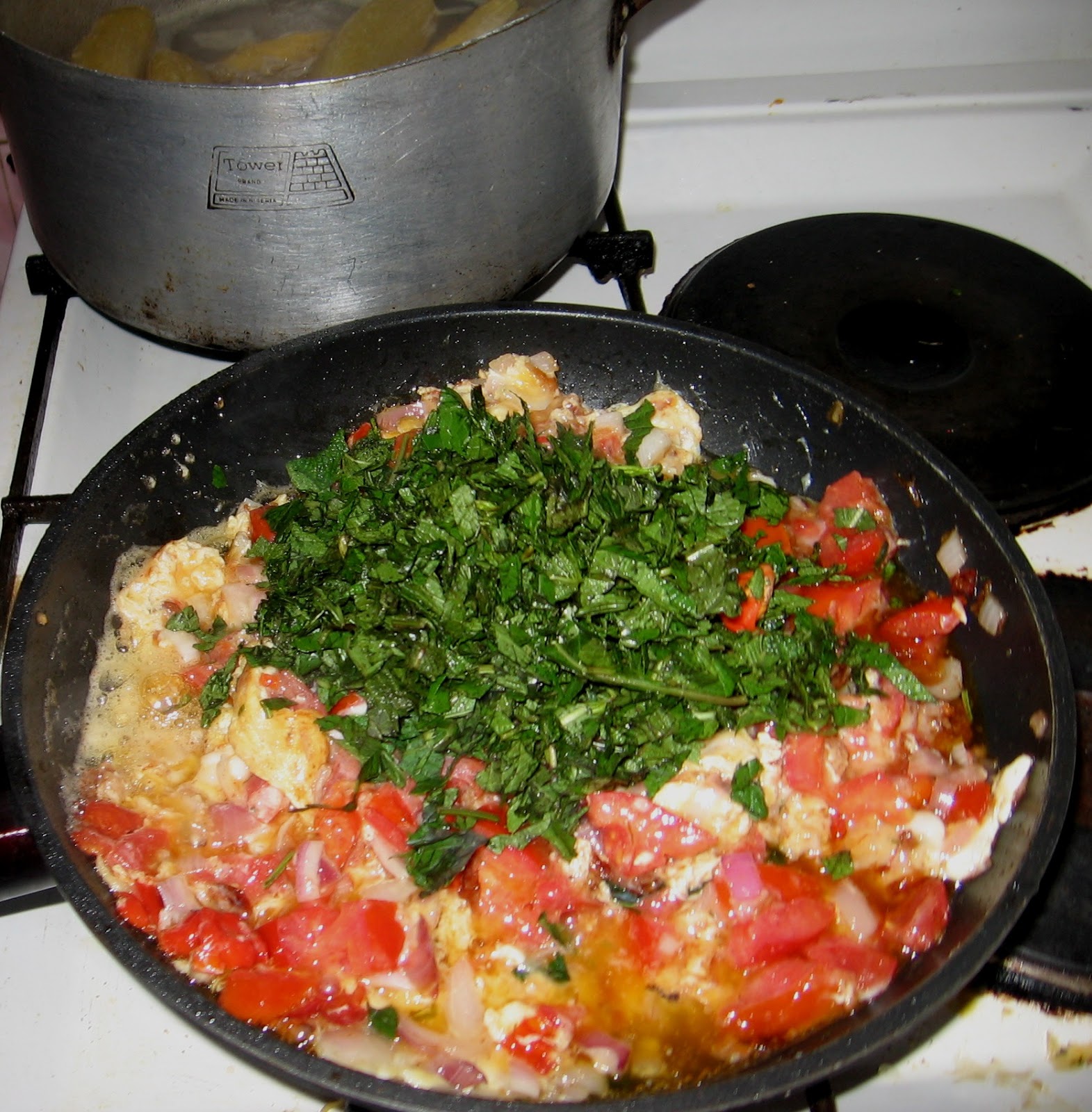 Boiled Plantain With Mint Leaves In Tomato Egg Sauce