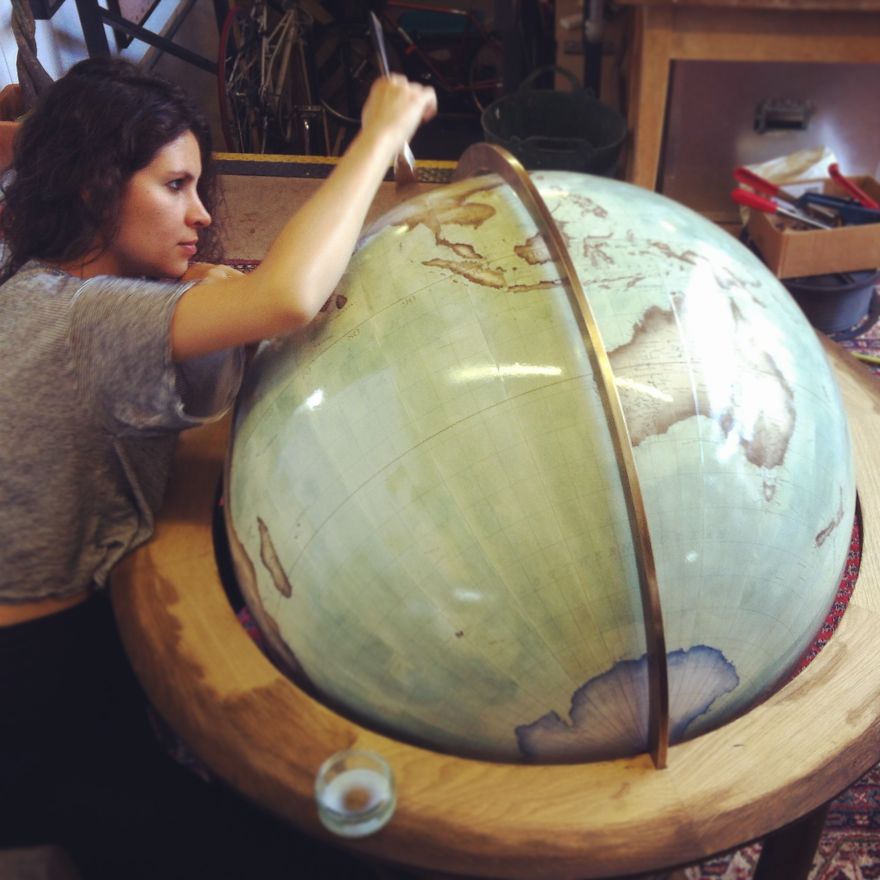 Varnishing an 80cm globe - One Of The World’s Last Remaining Globe-Makers That Use The Ancient Art Of Making Globes By Hand Varnishing an 80cm globe - One Of The World’s Last Remaining Globe-Makers That Use The Ancient Art Of Making Globes By Hand