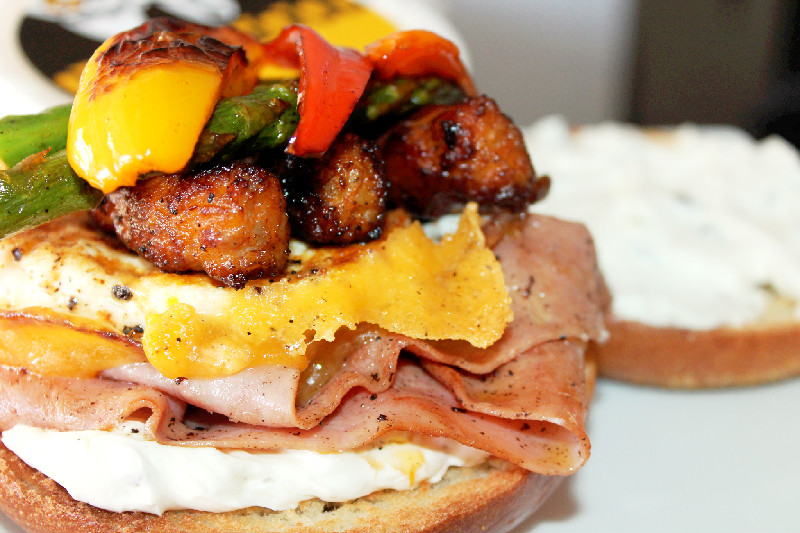 Creole Contessa Farmers Sandwich with Chorizo Sausage, Egg, Ham and Jalapeno Cream Cheese