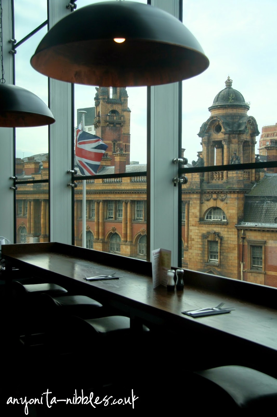 Tables overlooking London street and the abandoned fire station at Manchester Piccadilly | Anyonita-nibbles.co.uk