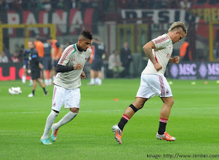 Kevin Prince Boateng and Philippe Mexes of Milan