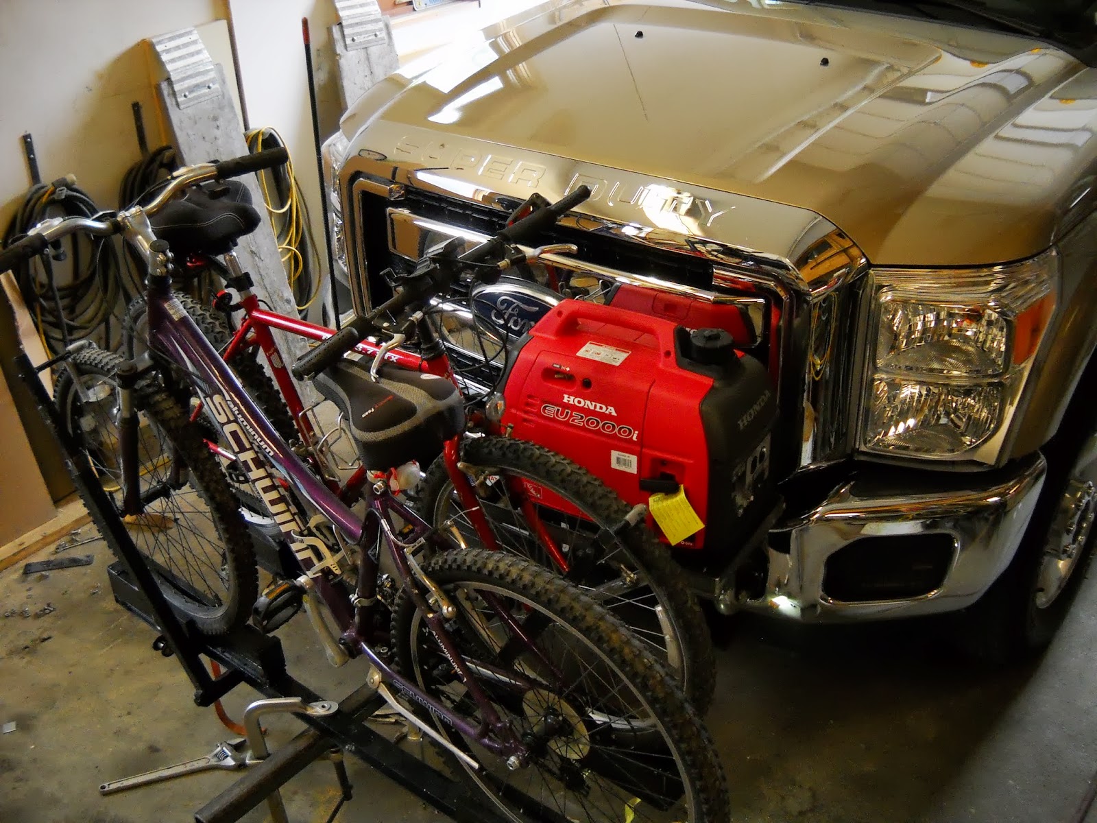 Boomers on the Move: Truck Camper Modifications….Generator & Bikes