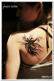 black totem phoenix tattoo on the back