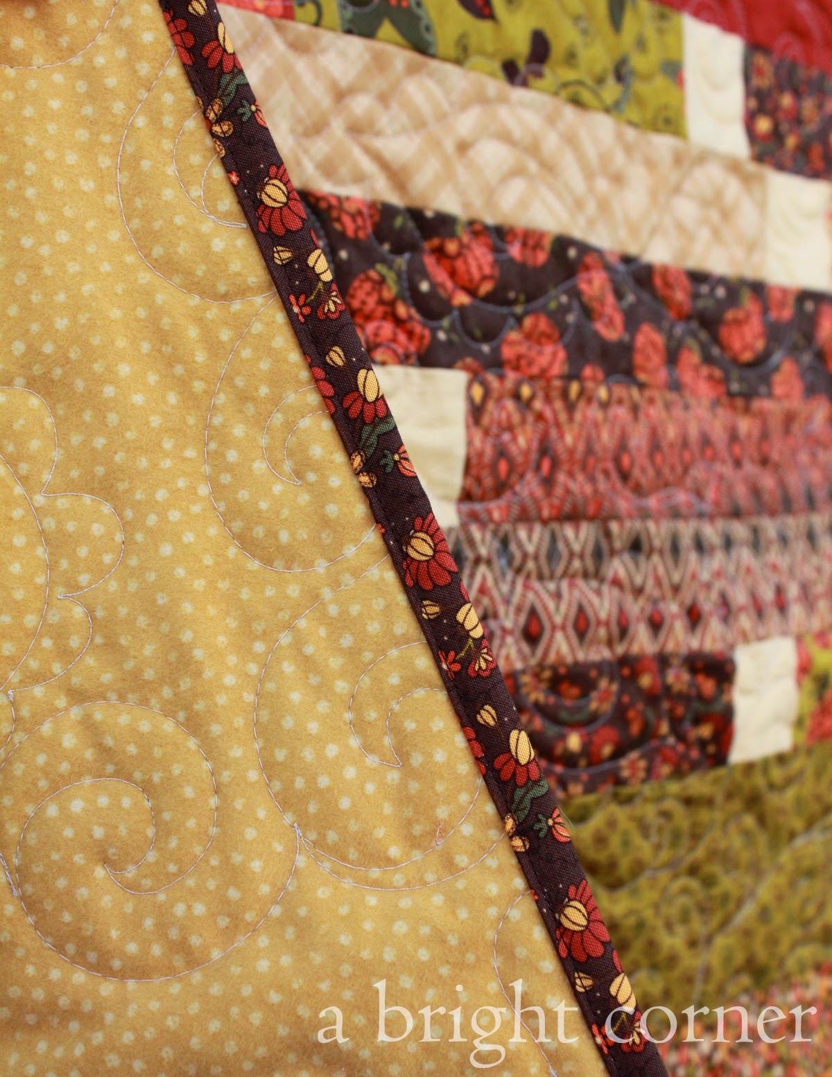 Jelly Roll Race Quilt in lovely fall colors!