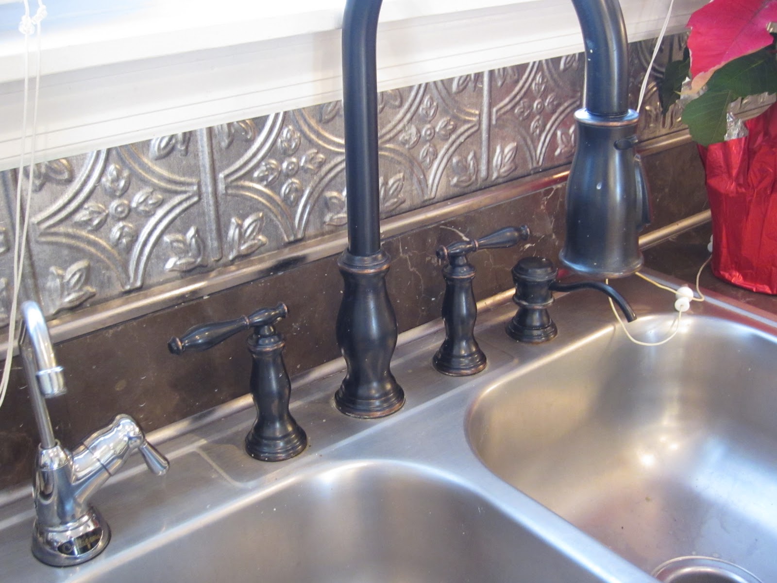 Oil rubbed bronze kitchen cabinet hardware Stainless Sink with Bronze Faucet