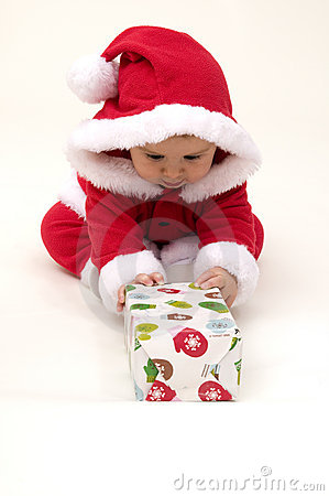 baby girl dressed up in santa