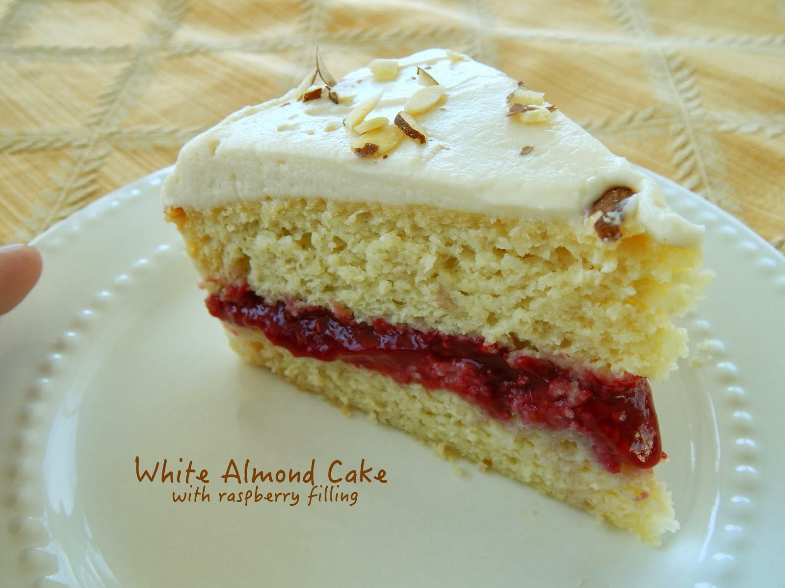 White Almond Cake with Raspberry Filling Cut The Wheat