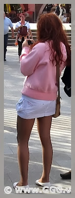 Girl in white skirt on the street