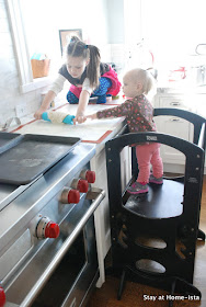 kids helping in the kitchen thanks to a learning tower
