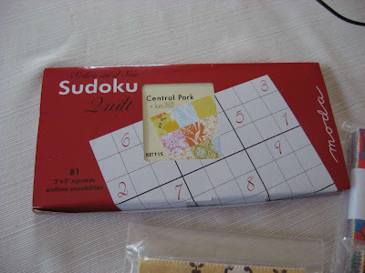 Shopping Loot - charm packs and Central Park Sudoku quilt kit