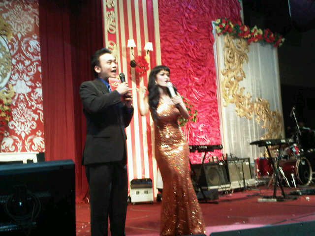 Mr. Eric Young  with Julia Perez  on stage