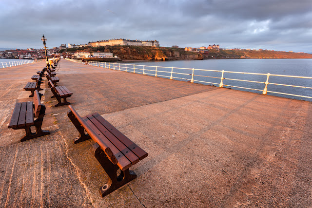 Sunrise image of Whitby pier in North Yorkshire by Martyn Ferry Photography