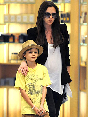 victoria beckham baby bump pictures. With a aby girl on the way in
