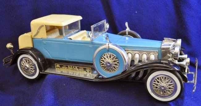 13909 Antiques: Vintage Sealed Jim Beam 1934 Dusenberg Model J Decanter