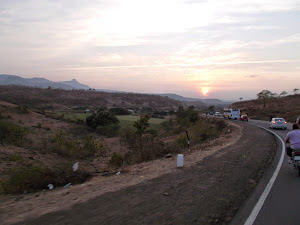The road back home to Mumbai at Sunset.