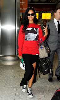 Rihanna arrives at London's Heathrow Airport on August 27th 2012.