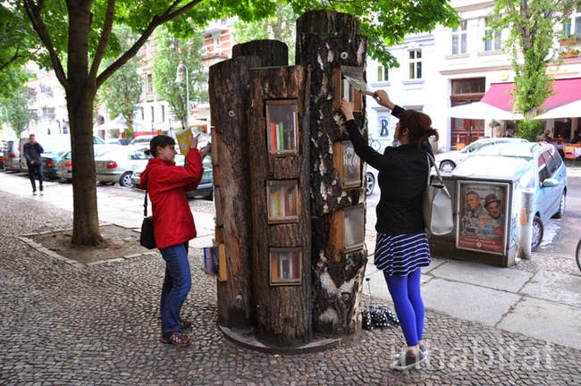 This is a really awesome idea, and a great way for books and reading to become more central in communities. - A Neighborhood In Germany Has An Awesome Book Exchange Inside Of Trees This is a really awesome idea, and a great way for books and reading to become more central in communities. - A Neighborhood In Germany Has An Awesome Book Exchange Inside Of Trees
