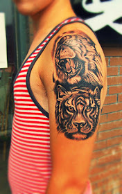 double tiger tattoo design on the arm