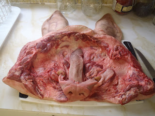 The flesh and skin removed in one piece from a pig's head