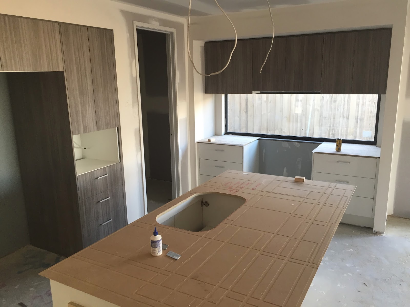 Building With Boutique Homes Kitchen Garage Door And Start Of Fixing