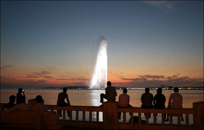 King Fahd's Fountain, also known as the Jeddah Fountain, is the tallest of its type of fountain in the world. Located in the coast of Jeddah, west coast of Kingdom of Saudi Arabia. The fountain jets water 1,024 feet (312 m) above the Red Sea. It was donated to the city of Jeddah by King Fahd, hence its name. The fountain is visible throughout the entire vicinity of Jeddah. The water it ejects can reach a speed of 375 kilometres (233 mi) per hour and its airborne mass can exceed 18 tons. It was constructed between 1980 and 1983 and began operating in 1985. The fountain uses saltwater taken from the Red Sea instead of freshwater. It uses over 500 spotlights to illuminate the fountain at night.