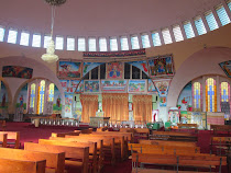 Inside of painting and icon rich St. Mary's of Zion Church, Aksum.  Women are now allowed here!