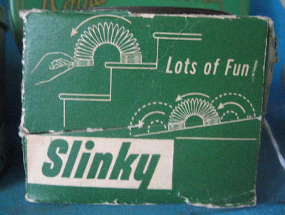 Green and white Slinky box, 1950s design style