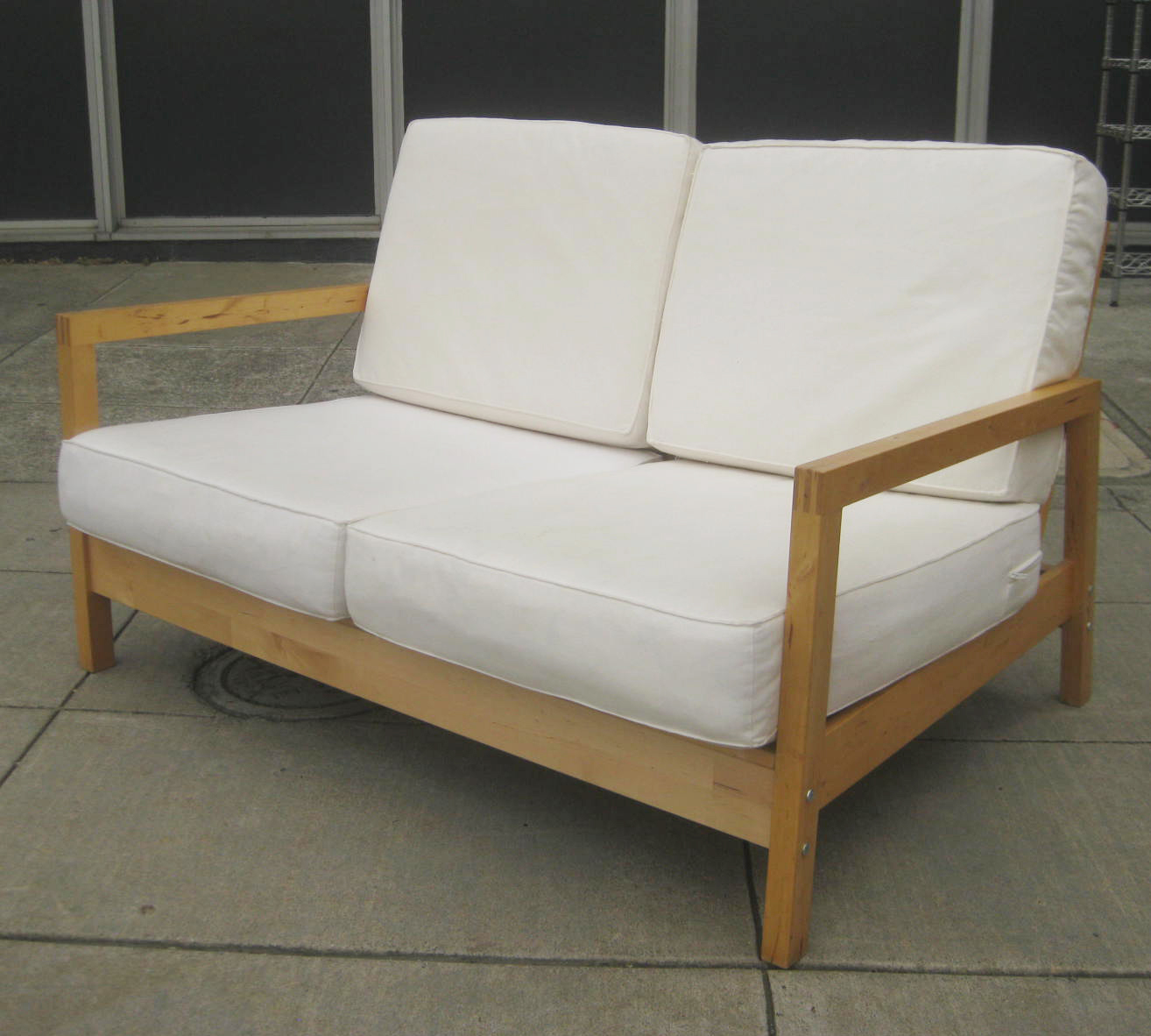 UHURU FURNITURE & COLLECTIBLES SOLD LoveseatFuton 50