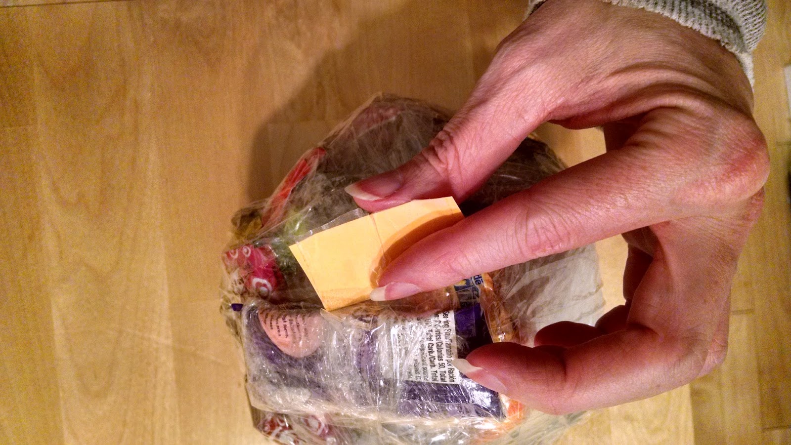 Must Run in the Family Party Game candy and a ball of tape