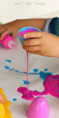 Drip painting with plastic Easter eggs - process art for preschoolers