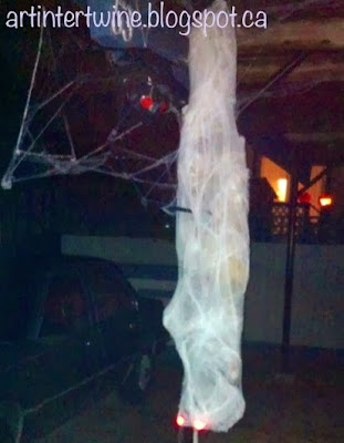 Art Intertwine - Homemade Spider and Victim Halloween Decor