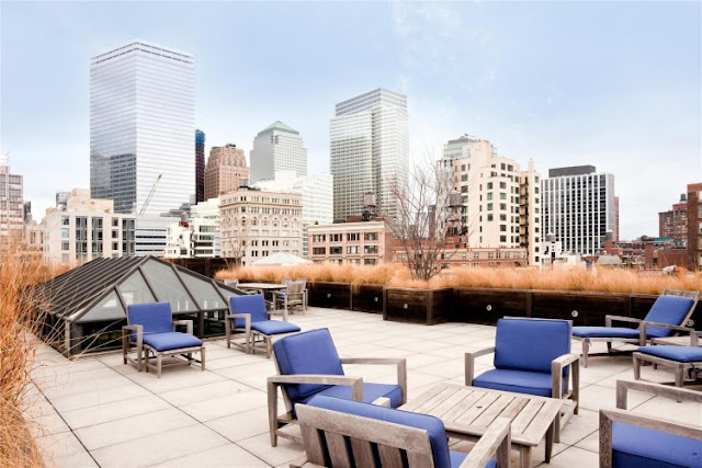 Photo of rooftop terrace with garden furniture in the Tribeca triplex