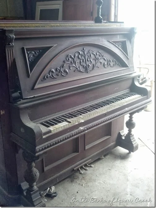 The before of a wood carved piano / Stylin' repurposed upright piano desk, by On the Banks of Squaw Creek, featured onhttp://www.ilovethatjunk.com