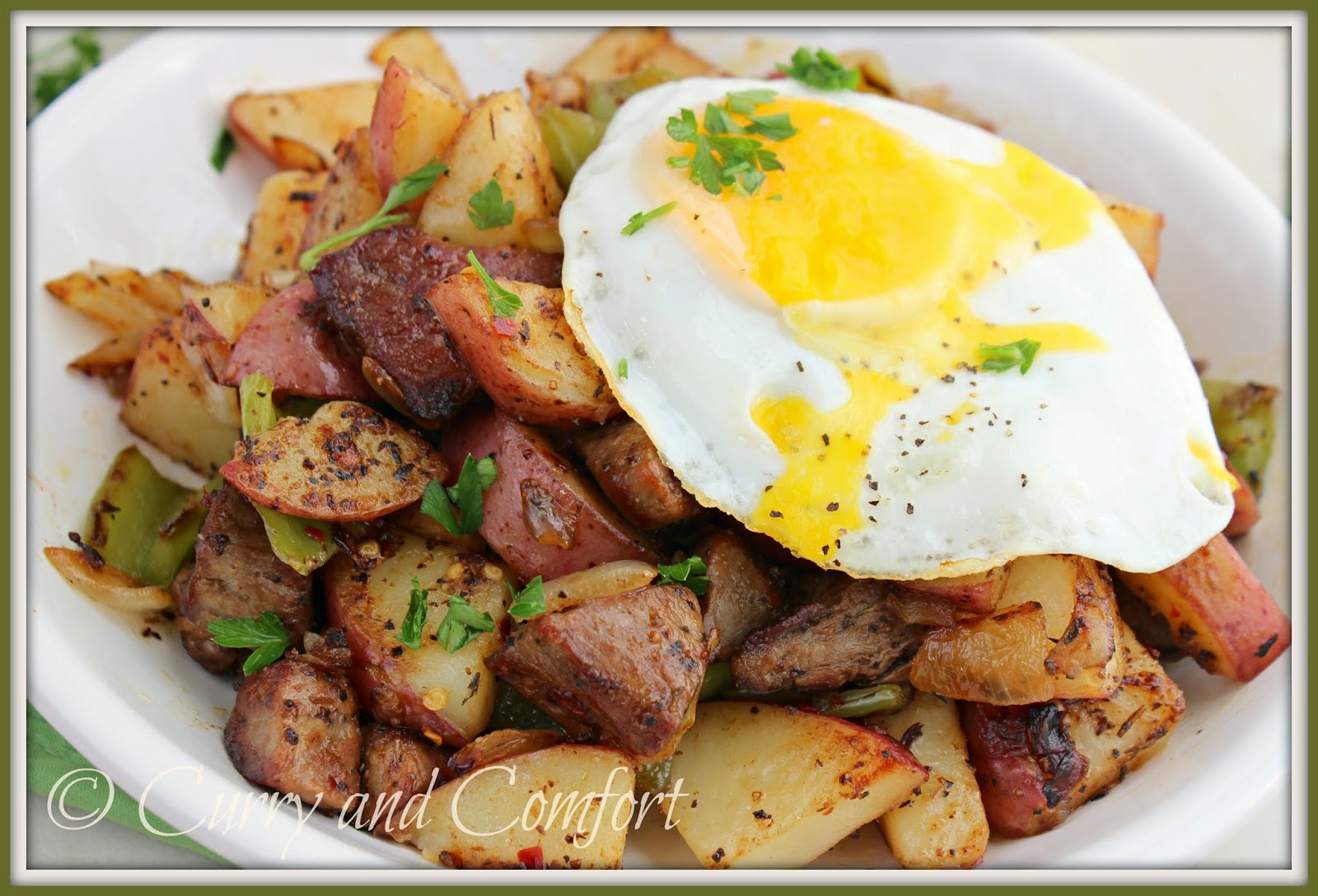 Kitchen Simmer Steak and Potato Hash Topped with a Fried Egg
