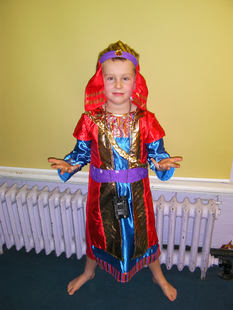 junior school nativity play wise man melchior brings gold as befits a king