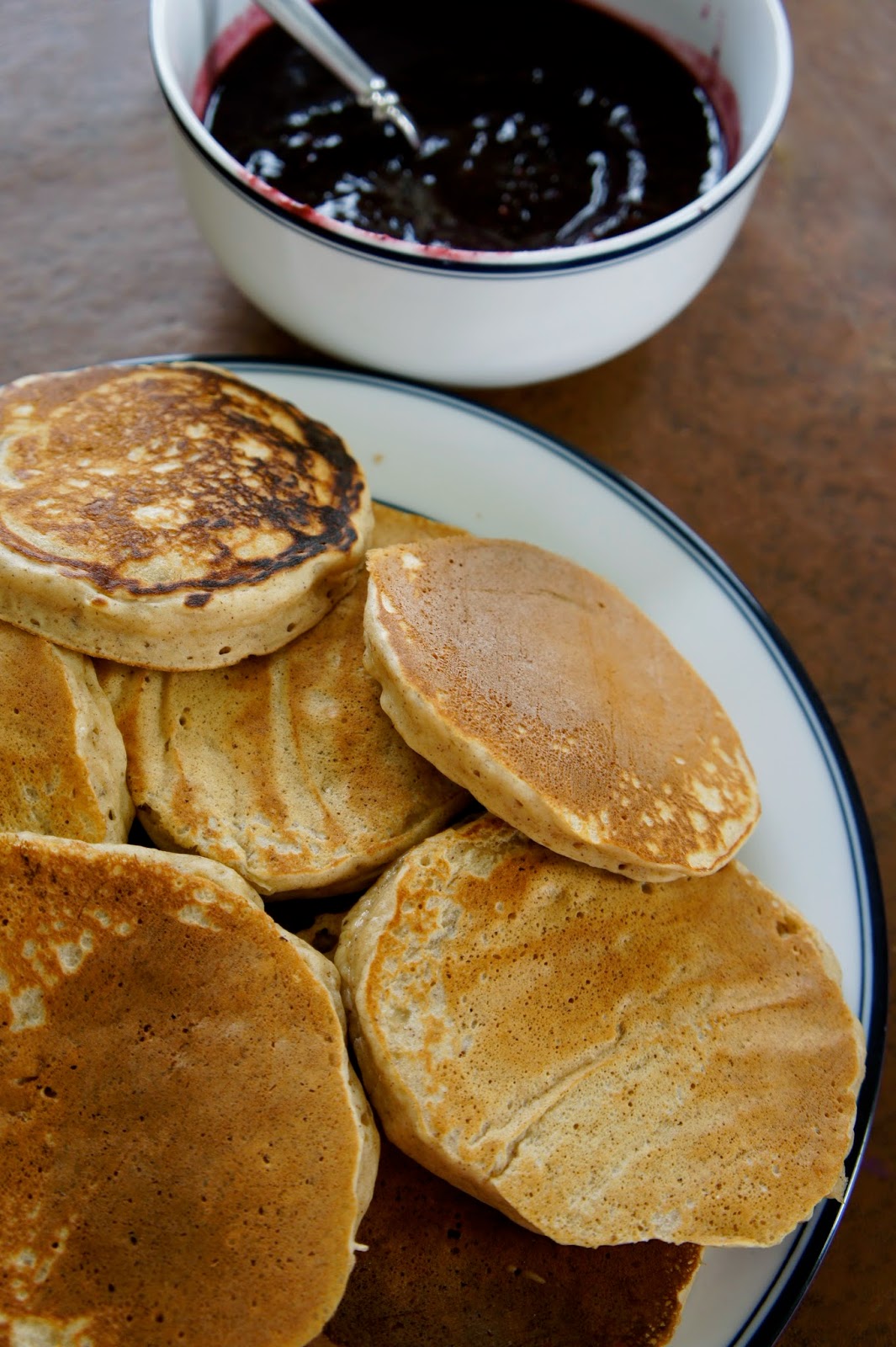 Savory Sweet and Satisfying Whole Wheat Banana Pancakes with Berry Sauce
